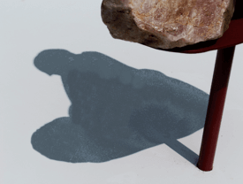 shadow of a buddha figure 